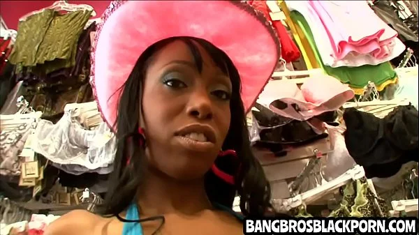 Black babe with huge tits sucks a big cock