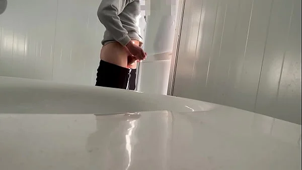 I surprise a girl who catches me jerking off in a public bathroom on the beach and helps me finish cumming