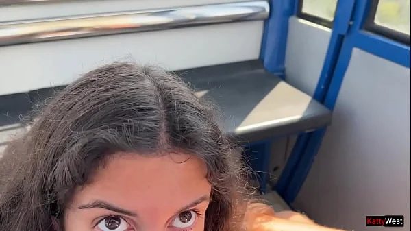 Beauty sucks cock on a Ferris wheel in an amusement park