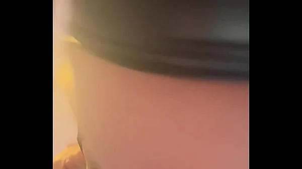 Tattooed brunette in leather lingerie does sexy dance, and has an orgasm while masturbating with a dildo