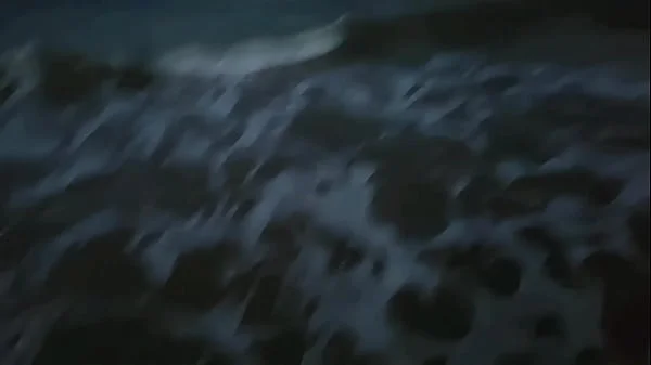 Blonde shows tits and sucks cock on a public beach