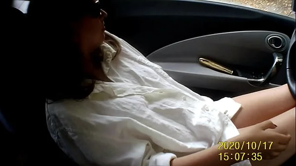 I'm masturbating with my dildo naked in my car