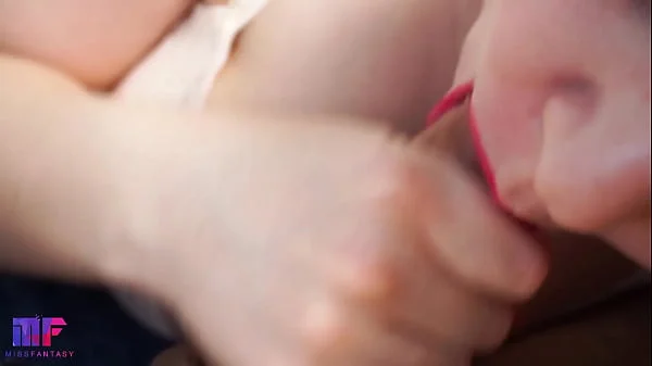 This babe gives the best blowjob with red lips, close-up