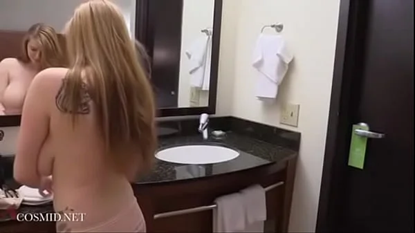 Amanda Love trying on bras