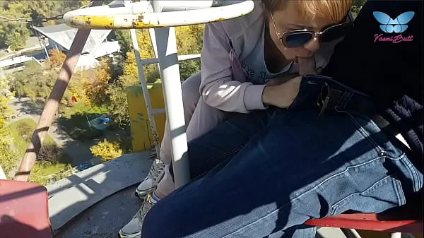 Public blowjob on the ferris wheel from shameless whore