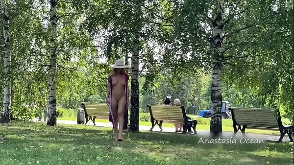 Beautiful girl shines tits walking in public
